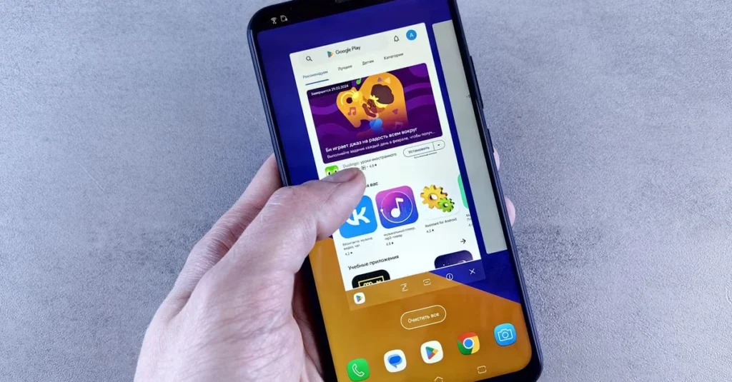 Hand holding smartphone displaying ecommerce personalized search results with product recommendations and colorful app icons.